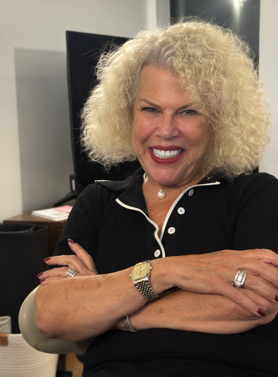 Author Esti Moore Shaitrit smiling
